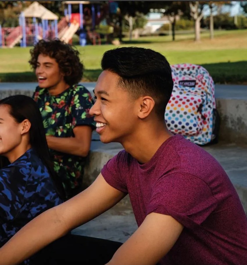 3 teenagers smiling